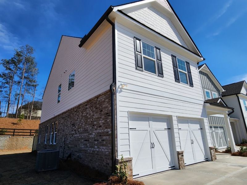 Representative exterior photo of a completed home built from the Boxwood Townhome by Piedmont Residential in The Retreat at Browns Ridge, Newnan, GA (Image 30).