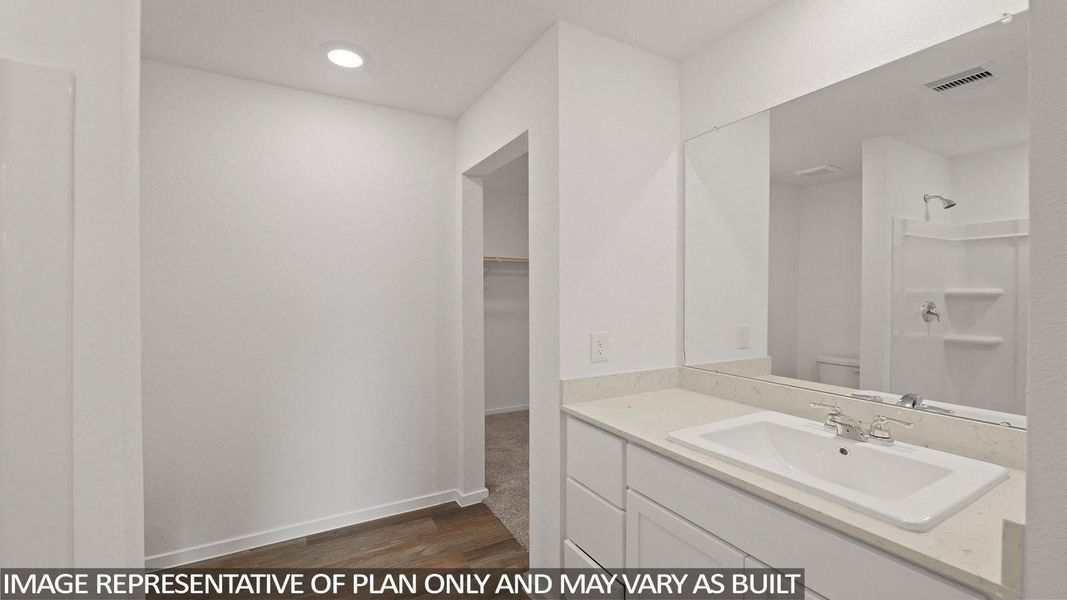 Furnished interior view inside a new home in Sunterra, Katy (Image 6).