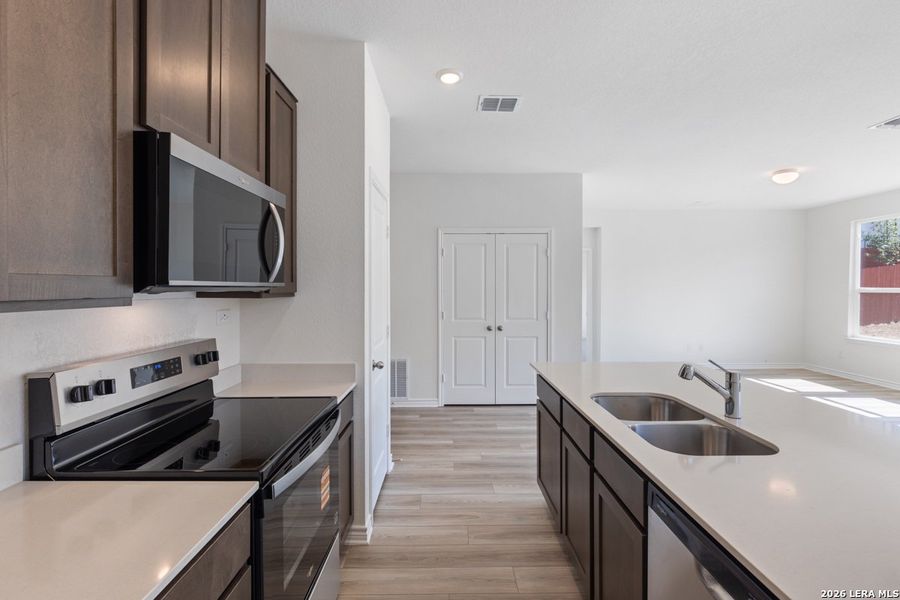 Furnished interior view inside a new home in Hidden Bluffs at TRP, San Antonio (Image 10).