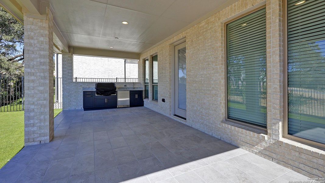 Exterior details and patio area of a home in The Dominion 70', San Antonio (Image 4). Exterior details and patio area of a home in The Dominion 70', San Antonio (Image 4).