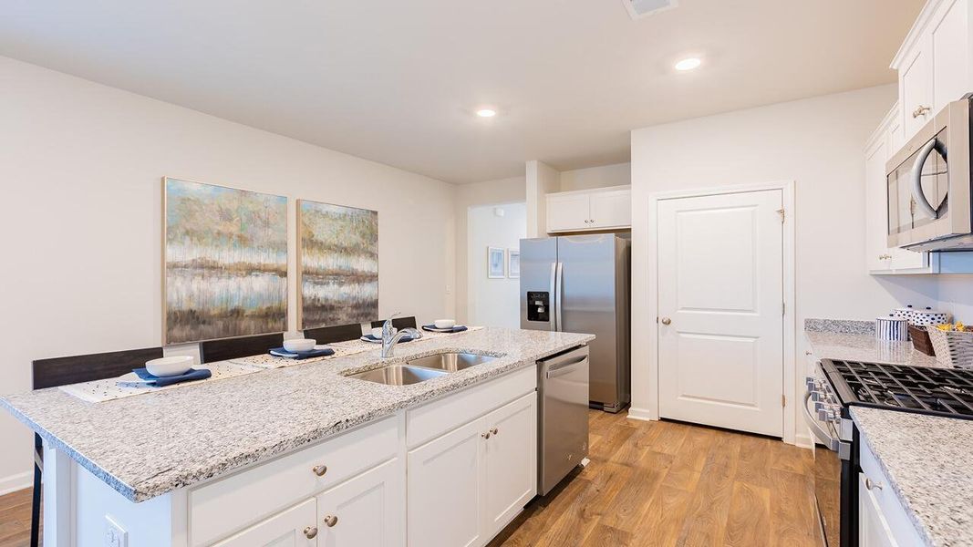 Furnished interior view inside a new home in Pine Hills at Cane Bay, Summerville (Image 9).