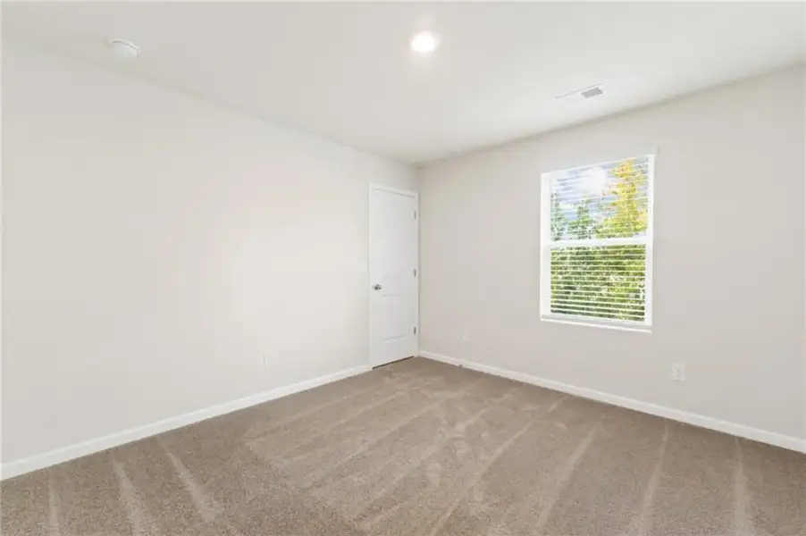 Spacious, unfurnished interior of a new home in Millstone Manor, Conyers (Image 14). Spacious, unfurnished interior of a new home in Millstone Manor, Conyers (Image 14).