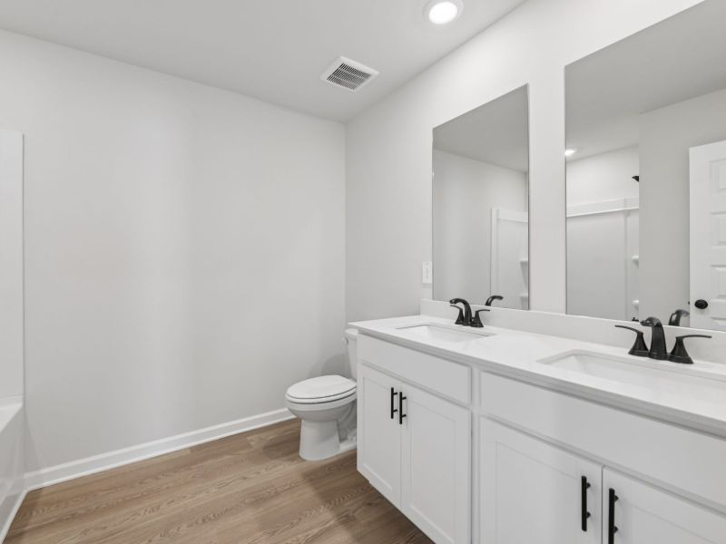 The Taylorsville floorplan with the Divine White interior package.