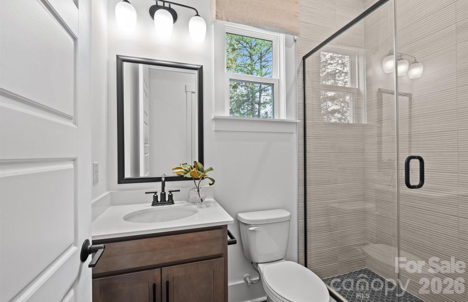 Guest Suite Bath with Full Tile Walk-In Shower. Representative Photo Guest Suite Bath with Full Tile Walk-In Shower. Representative Photo
