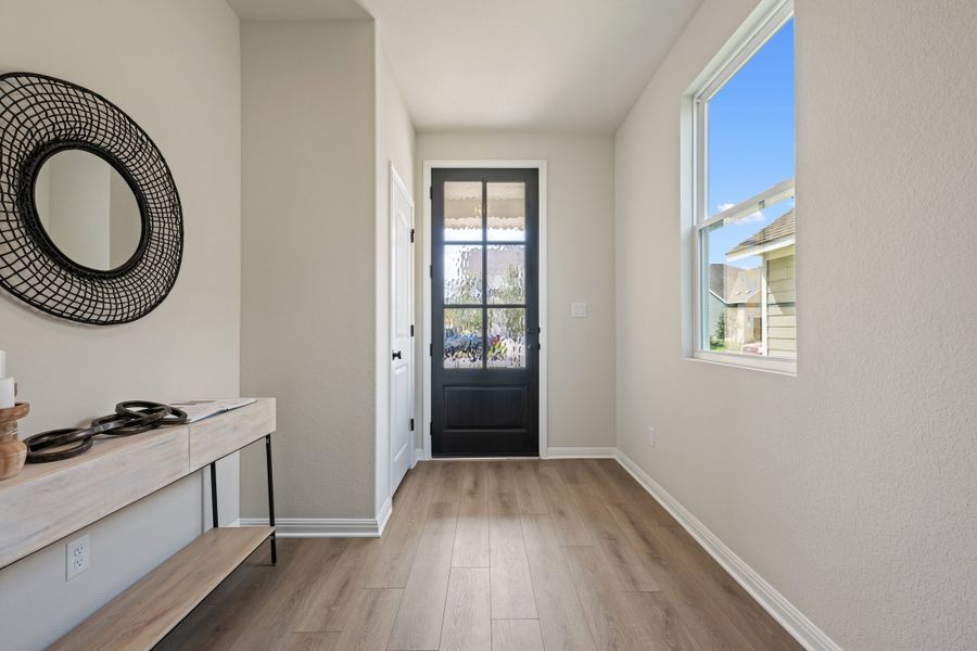 Representative furnished interior of a home built from the Granbury by Ashton Woods in The Trails at Carmel, Pflugerville (Image 5).