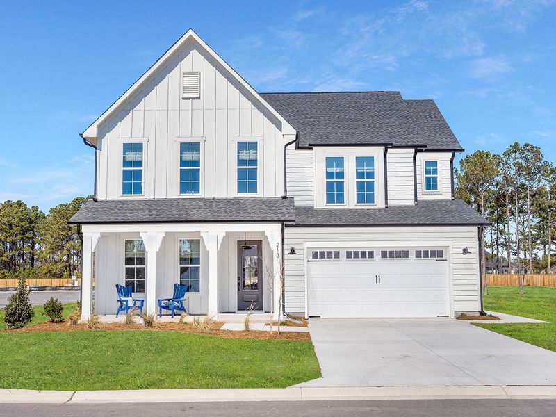 Representative exterior photo of a completed home built from the The Hampton by RobuckHomes in Windwater, Hampstead, NC (Image 29).