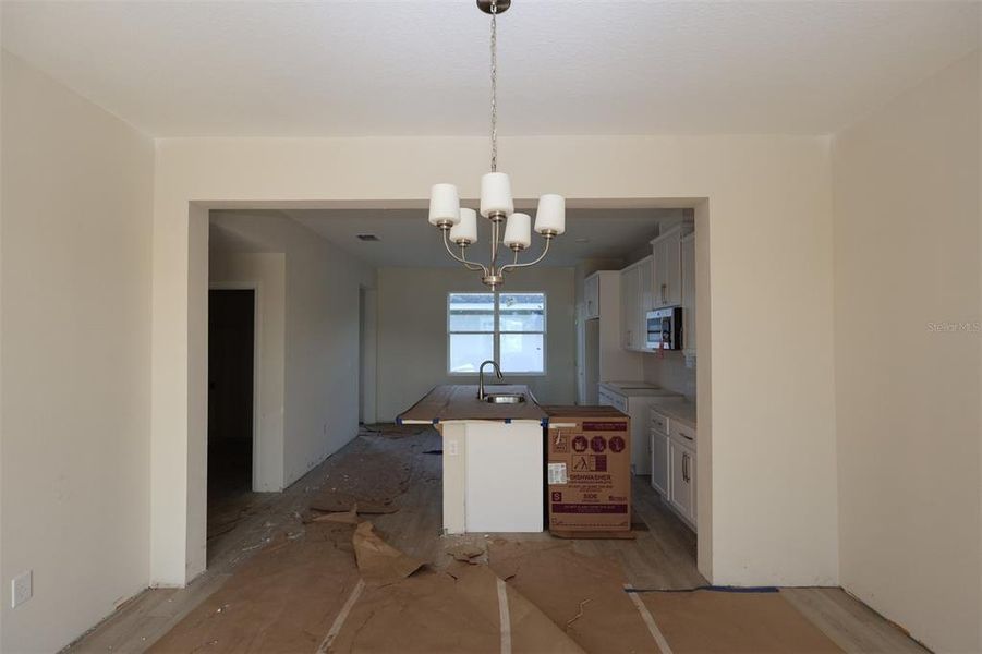 In-progress construction of a new home in Center Lake on the Park, St. Cloud, FL (Image 16).