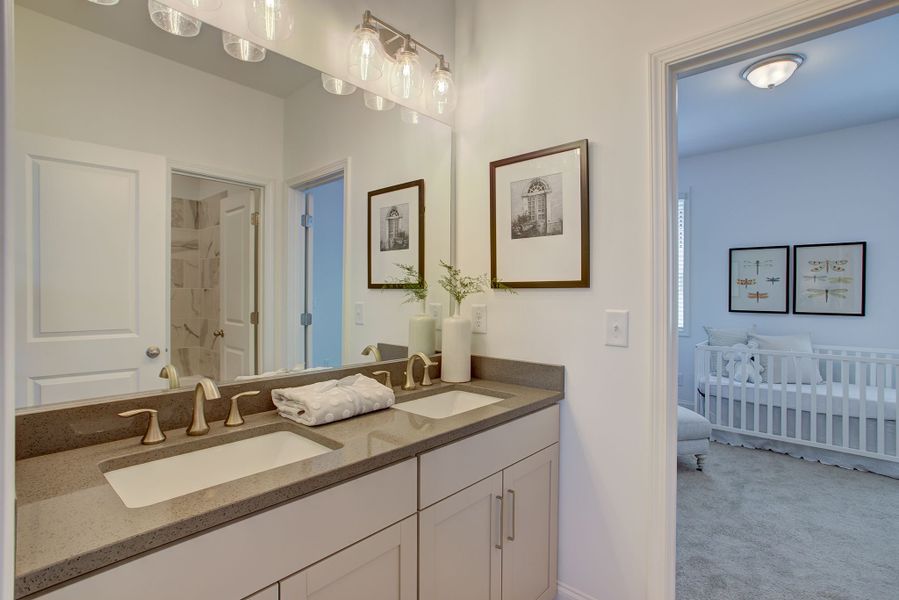 Dual vanity sinks within the bathroom