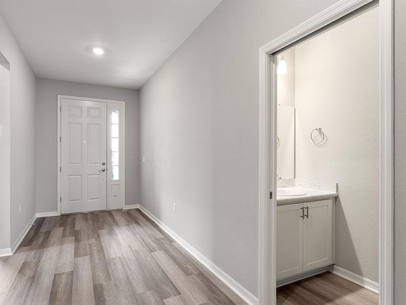 And, a powder room off the foyer serves your guests - Aubrey by Highland Homes And, a powder room off the foyer serves your guests - Aubrey by Highland Homes