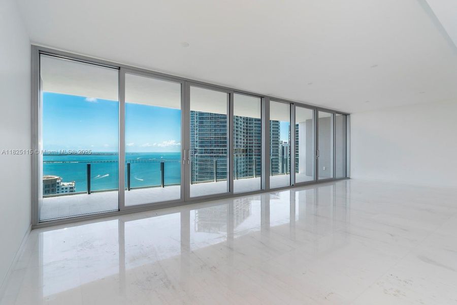 Spacious, unfurnished interior of a new home in Aston Martin Residences, Miami (Image 25).