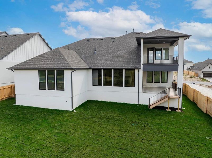 Exterior details and patio area of a home in Lariat - 80', Liberty Hill (Image 2). Exterior details and patio area of a home in Lariat - 80', Liberty Hill (Image 2).