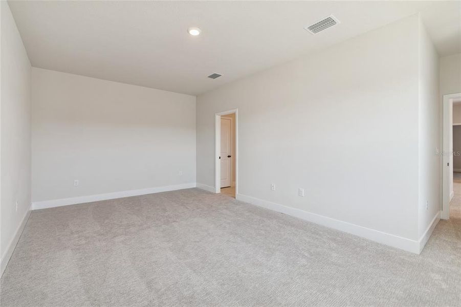 Spacious, unfurnished interior of a new home in Emerald Landing at Waterside at Lakewood Ranch – Cottage Series, Sarasota (Image 32).