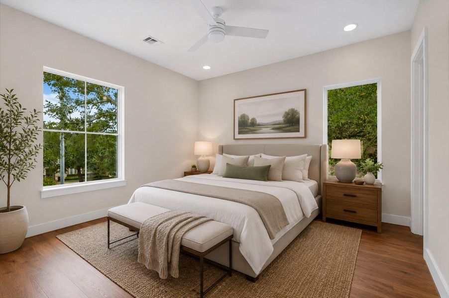 This serene secondary bedrooms offer a peaceful retreat, featuring warm wood floors, oversized windows that create a light-filled, inviting atmosphere these bedrooms provide the perfect balance of luxury, comfort, and everyday livability.  Virtually staged to illustrate furnishing possibilities