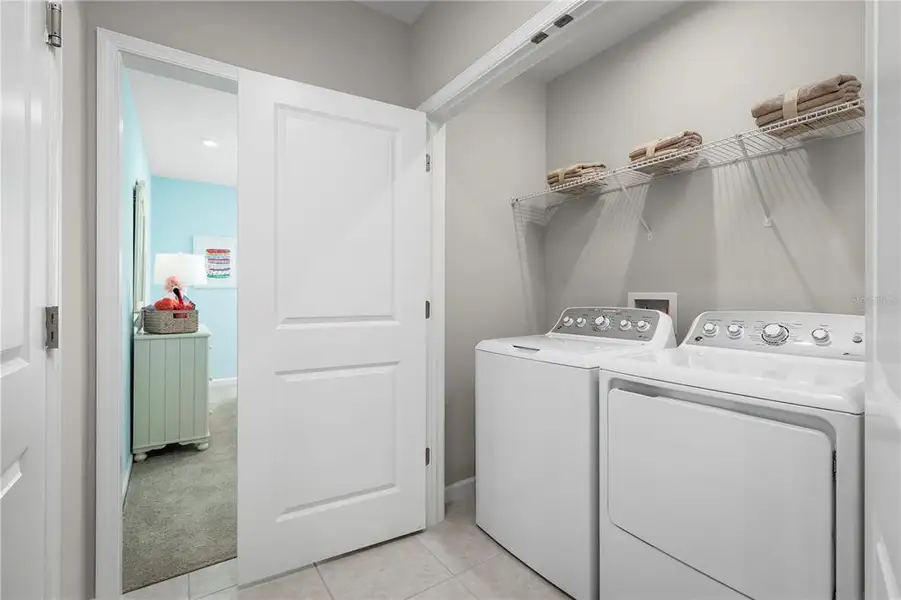 Furnished interior view inside a new home in Ashton Covey, Winter Haven (Image 8).