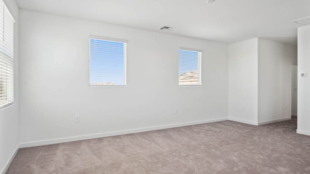 Spacious, unfurnished interior of a new home in Radiance at Superstition Vistas, Apache Junction (Image 25).