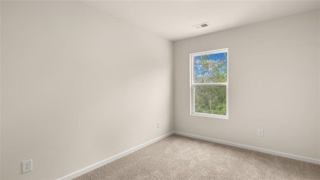 Spacious, unfurnished interior of a new home in Young's Crossing, Stone Mountain (Image 20).