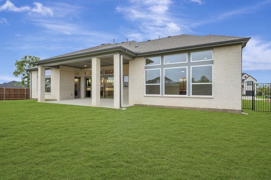 Exterior details and patio area of a home in Northshore at Lakewood Village - Estate Series, Lakewood Village (Image 3).