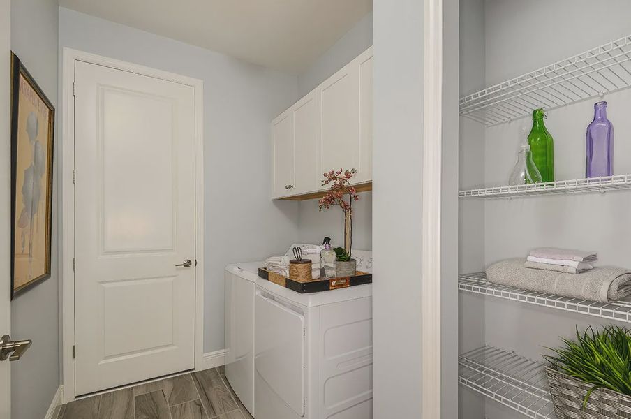Representative furnished interior of a home built from the White Star by Neal Communities in SkySail, Naples (Image 7).