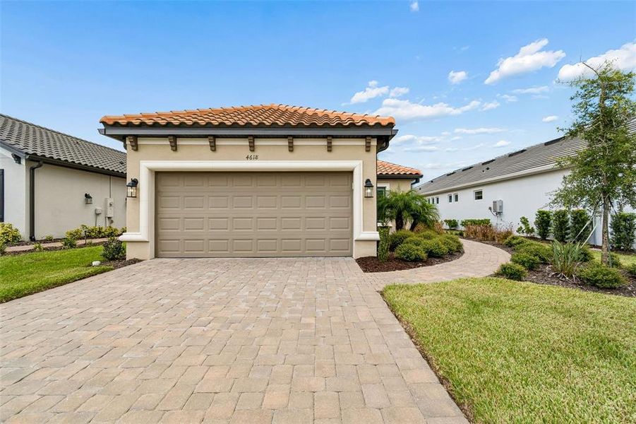 Front exterior of a new home in , Wesley Chapel, FL, highlighting curb appeal (Image 1). Front exterior of a new home in , Wesley Chapel, FL, highlighting curb appeal (Image 1).