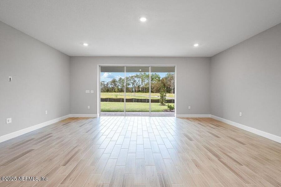 Spacious, unfurnished interior of a new home in Colbert Landings, Palm Coast (Image 29).