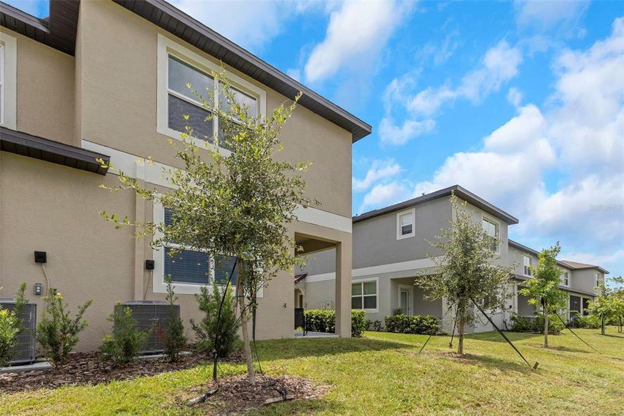 Front exterior of a new home in , Land O' Lakes, FL, highlighting curb appeal (Image 24).