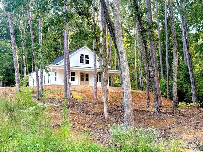 Front exterior of a new home in , Mount Gilead, NC, highlighting curb appeal (Image 12).