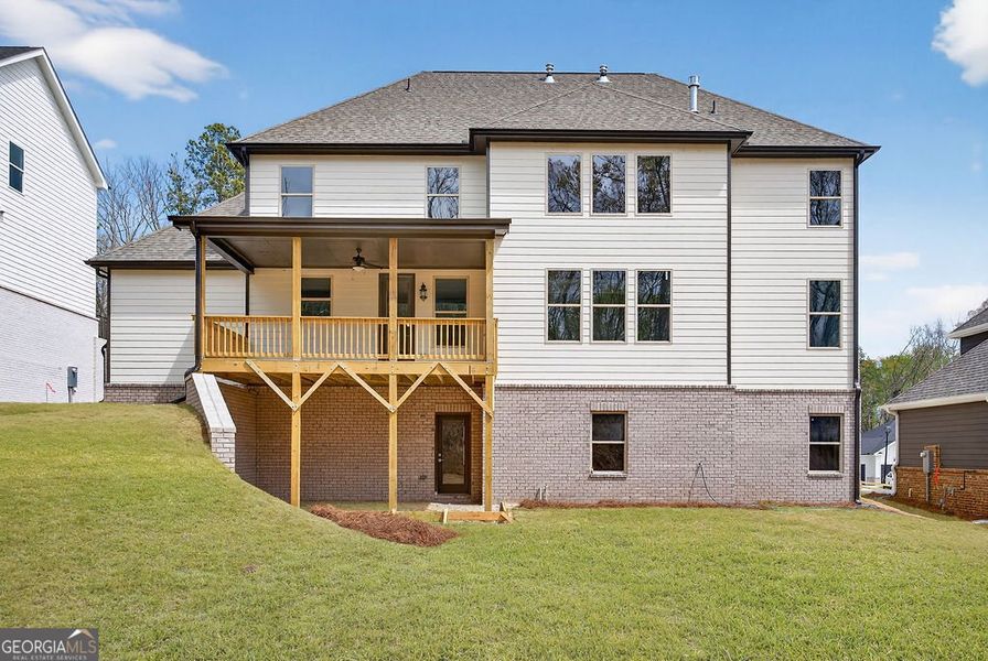 Exterior details and patio area of a home in The Manor at Gainesville Township, Gainesville (Image 3).