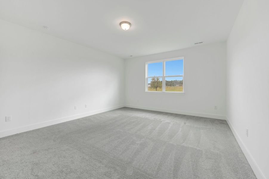 Spacious, unfurnished interior of a new home in McAlister Creek, Clayton (Image 20).
