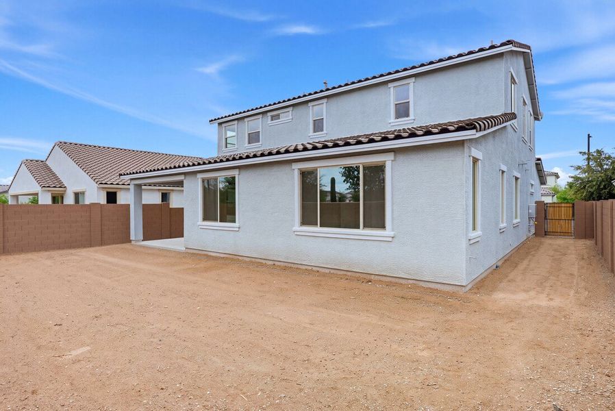 Exterior details and patio area of a home in Rancho Mercado, Surprise (Image 4).