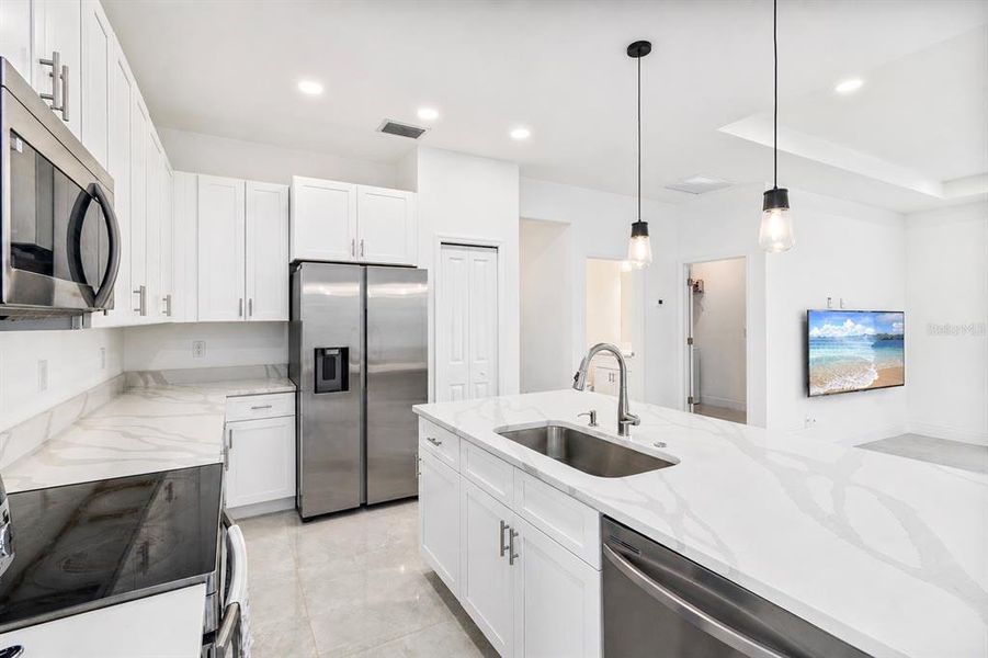Furnished interior view inside a new home in , Port Charlotte (Image 13).