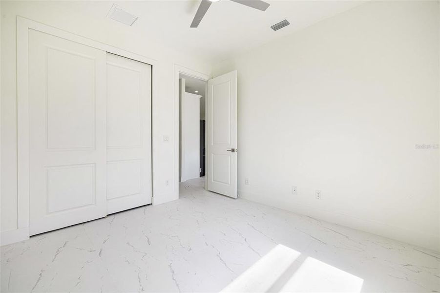 Spacious, unfurnished interior of a new home in , Port Charlotte (Image 29).