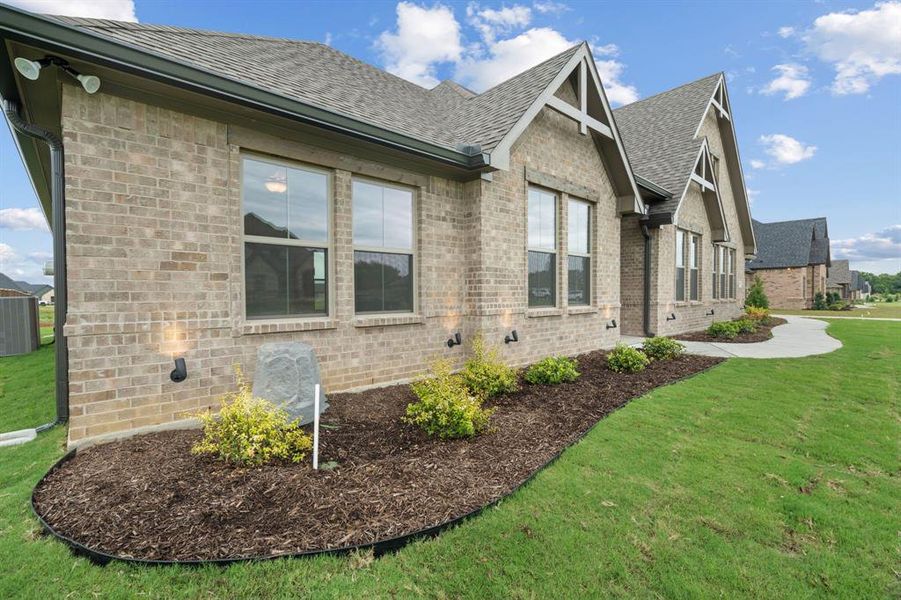 Front exterior of a new home in , Paradise, TX, highlighting curb appeal (Image 1).