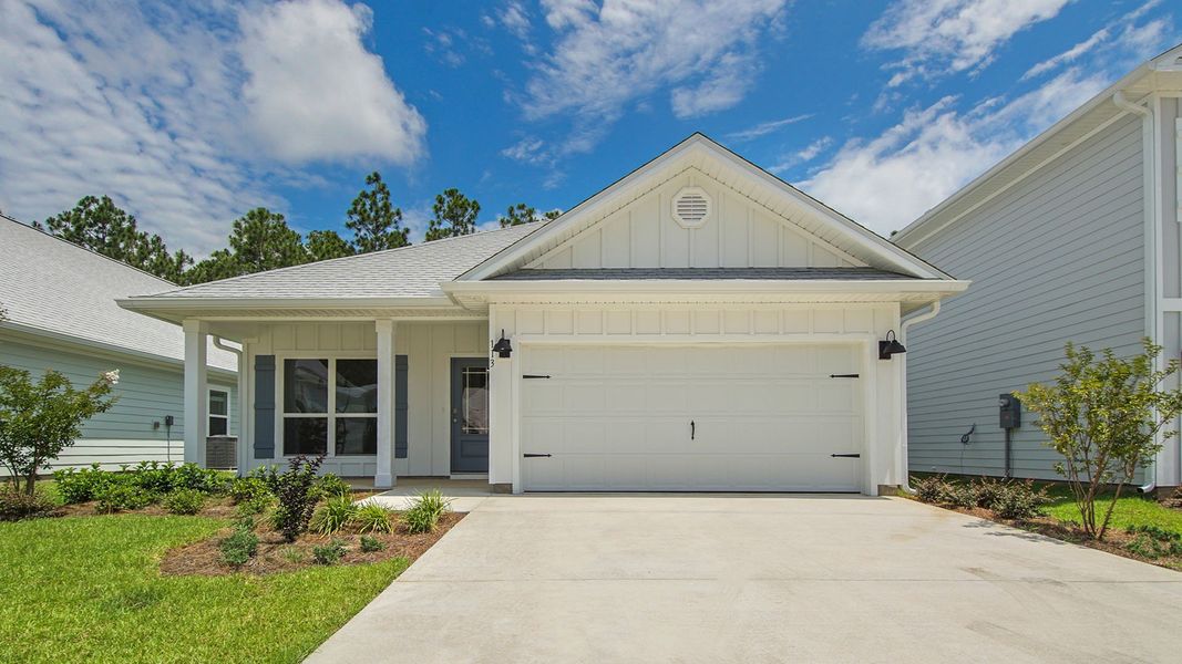 Front exterior of a new home in Bayside at Ward Creek, Panama City Beach, FL, highlighting curb appeal (Image 1). Front exterior of a new home in Bayside at Ward Creek, Panama City Beach, FL, highlighting curb appeal (Image 1).