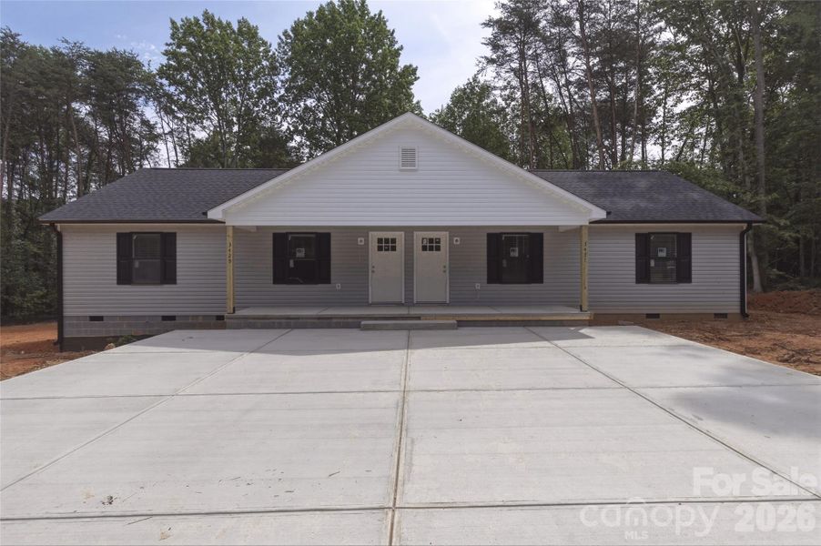 Front exterior of a new home in , Maiden, NC, highlighting curb appeal (Image 1). Front exterior of a new home in , Maiden, NC, highlighting curb appeal (Image 1).