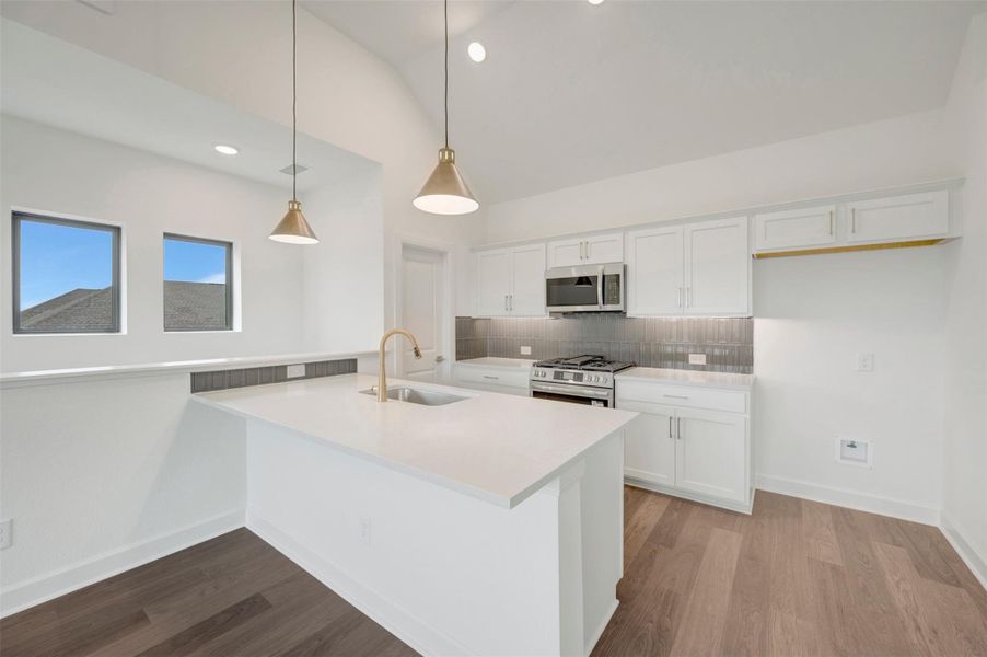 Furnished interior view inside a new home in Riceland - Enclave Row Collection, Mont Belvieu (Image 10).