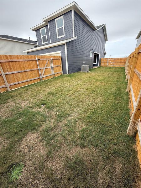 Exterior details and patio area of a home in Valverde, Bastrop (Image 3).