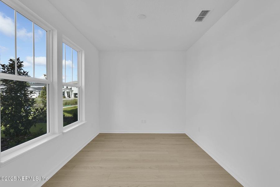 Spacious, unfurnished interior of a new home in Hawthorn Park at Wildlight, Yulee (Image 23).