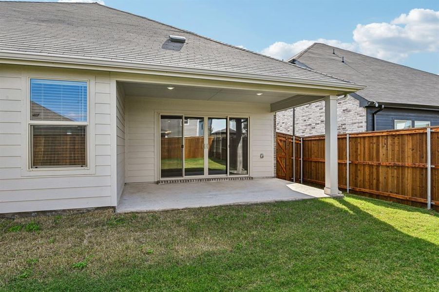 Exterior details and patio area of a home in Lakehaven - Signature Series, Farmersville (Image 3). Exterior details and patio area of a home in Lakehaven - Signature Series, Farmersville (Image 3).