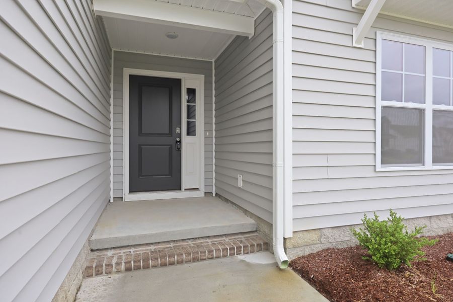Exterior details and patio area of a home in Davenport Farms, Winterville (Image 25). Exterior details and patio area of a home in Davenport Farms, Winterville (Image 25).
