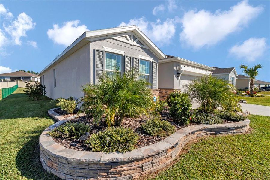 Front exterior of a new home in JB Ranch, Ocala, FL, highlighting curb appeal (Image 23). Front exterior of a new home in JB Ranch, Ocala, FL, highlighting curb appeal (Image 23).