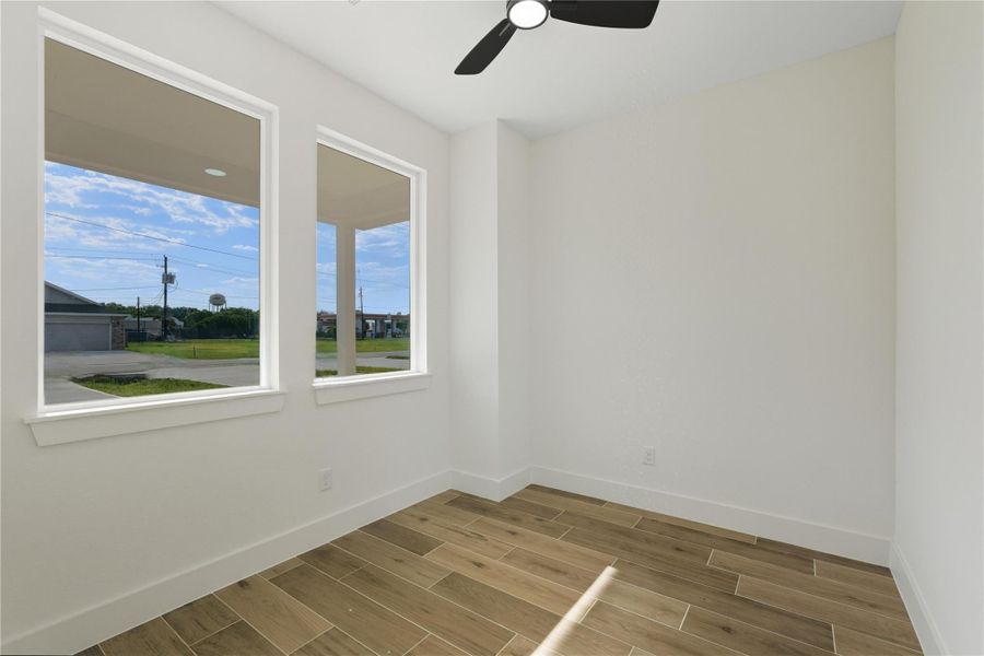 This brand-new home includes a versatile bonus room with large windows that fill the space with natural light. Perfect as a home office, study, playroom, or creative corner, it’s designed with durable wood-look tile flooring and a fresh, modern feel. Whether you need a quiet workspace or an extra spot to relax, this flexible room gives you options to make this home your own. This brand-new home includes a versatile bonus room with large windows that fill the space with natural light. Perfect as a home office, study, playroom, or creative corner, it’s designed with durable wood-look tile flooring and a fresh, modern feel. Whether you need a quiet workspace or an extra spot to relax, this flexible room gives you options to make this home your own.