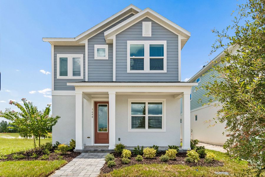 Representative exterior photo of a completed home built from the The Nagle by David Weekley Homes in Palmeras at Crossprairie – The Magnolia Collection, St. Cloud, FL (Image 2). Representative exterior photo of a completed home built from the The Nagle by David Weekley Homes in Palmeras at Crossprairie – The Magnolia Collection, St. Cloud, FL (Image 2).