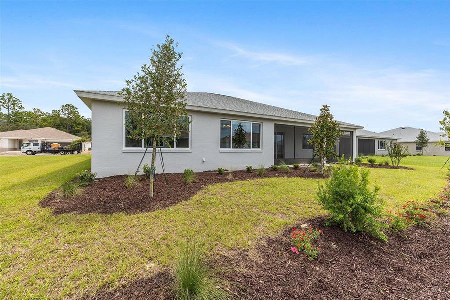 Exterior details and patio area of a home in On Top of the World Communities, Ocala (Image 30).
