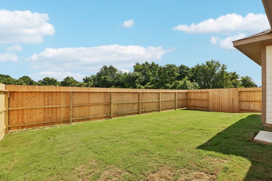 Exterior details and patio area of a home in Mustang Meadows, Waller (Image 4).