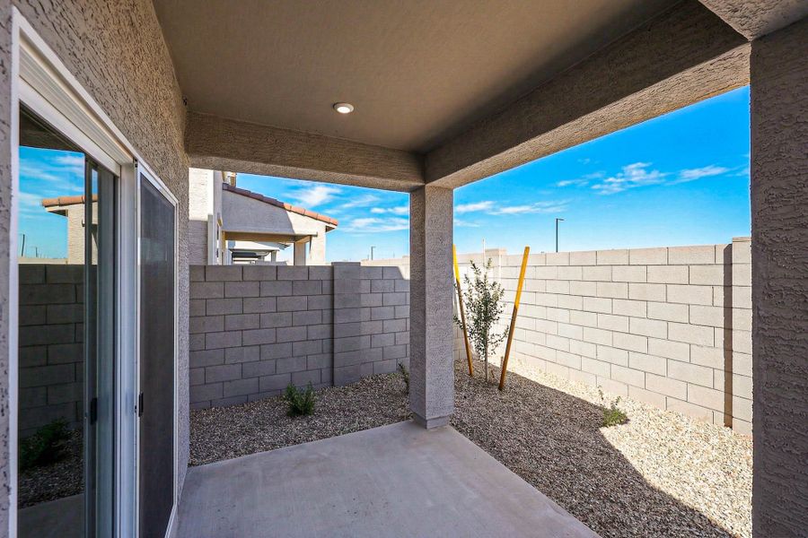 A house with a stone patio. A house with a stone patio.