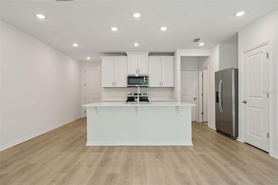 Furnished interior view inside a new home in Bradford Park, Ormond Beach (Image 11).
