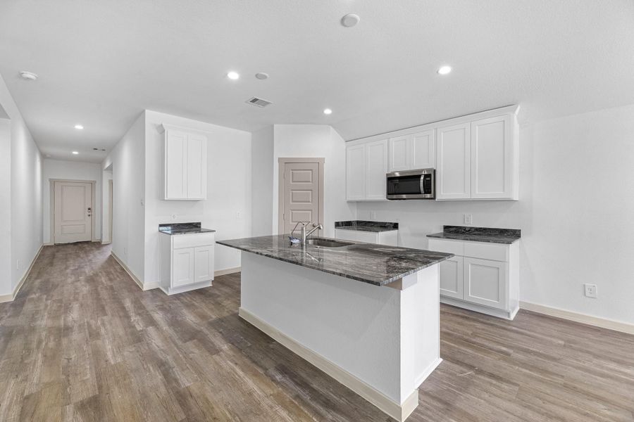 Furnished interior view inside a new home in Watermark, Alvin (Image 4).