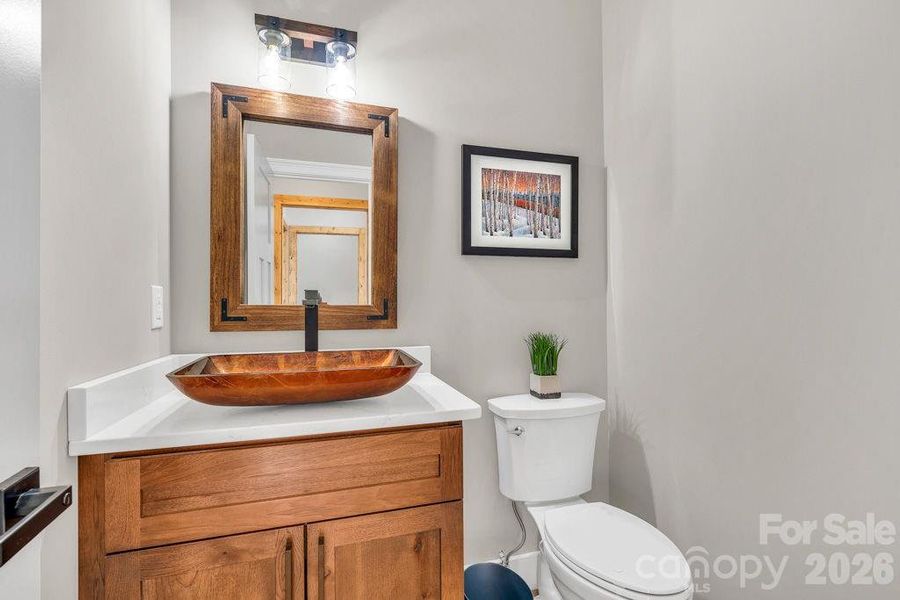 Half bath near foyer Half bath near foyer