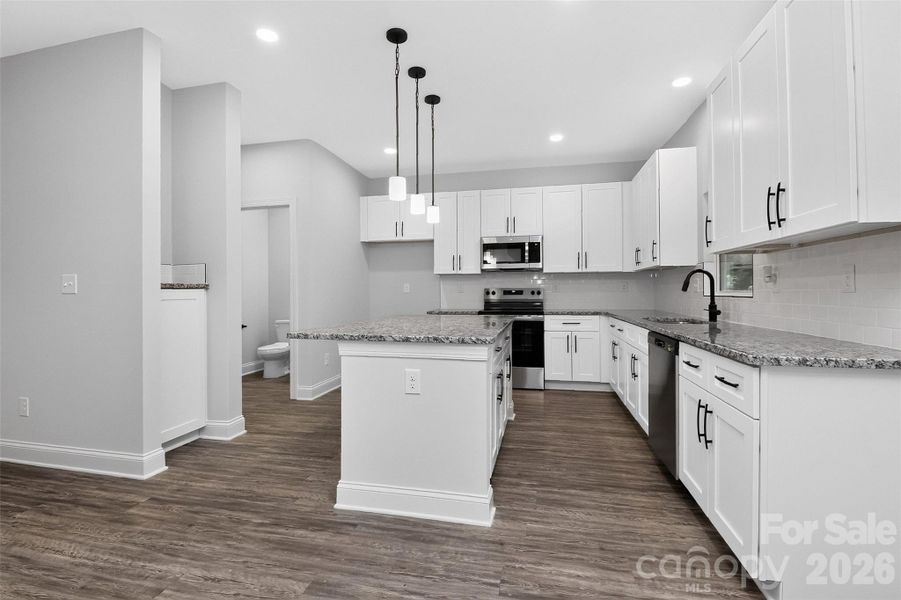 Furnished interior view inside a new home in , Belmont (Image 10).