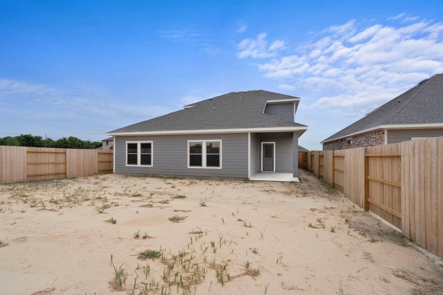 Front exterior of a new home in River Ranch Trails, Dayton, TX, highlighting curb appeal (Image 12). Front exterior of a new home in River Ranch Trails, Dayton, TX, highlighting curb appeal (Image 12).